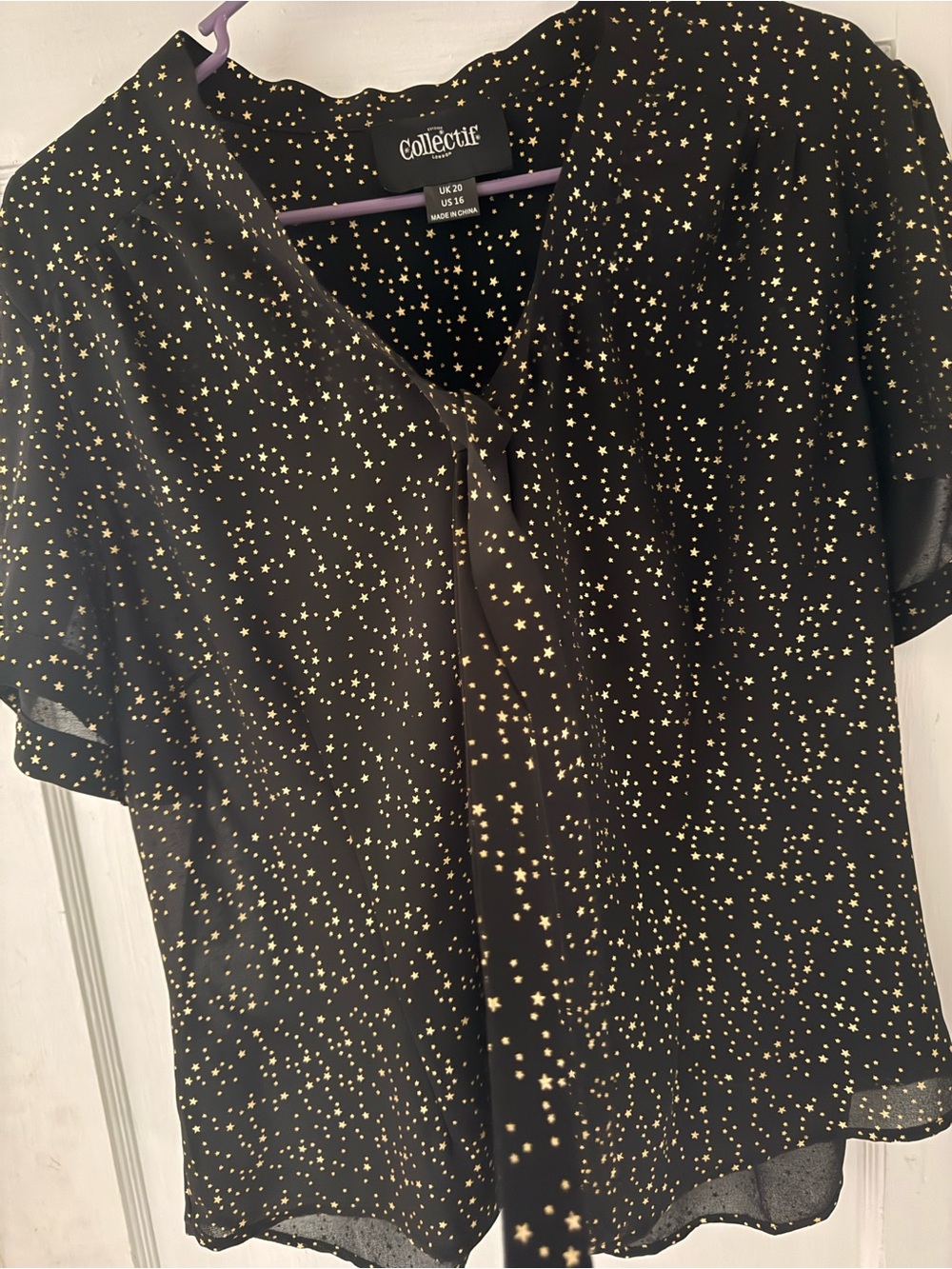 Collectif Black Blouse with Gold Star Print